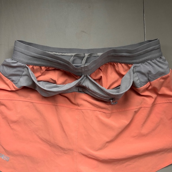 HokA One One SG Trail Short S Pockets Sun Baked Peach Run - Picture 7 of 10